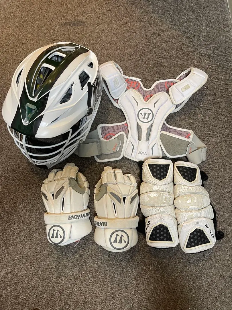 Thumbnail of Lacrosse helmet, shoulder pads, elbow pads, and glove set