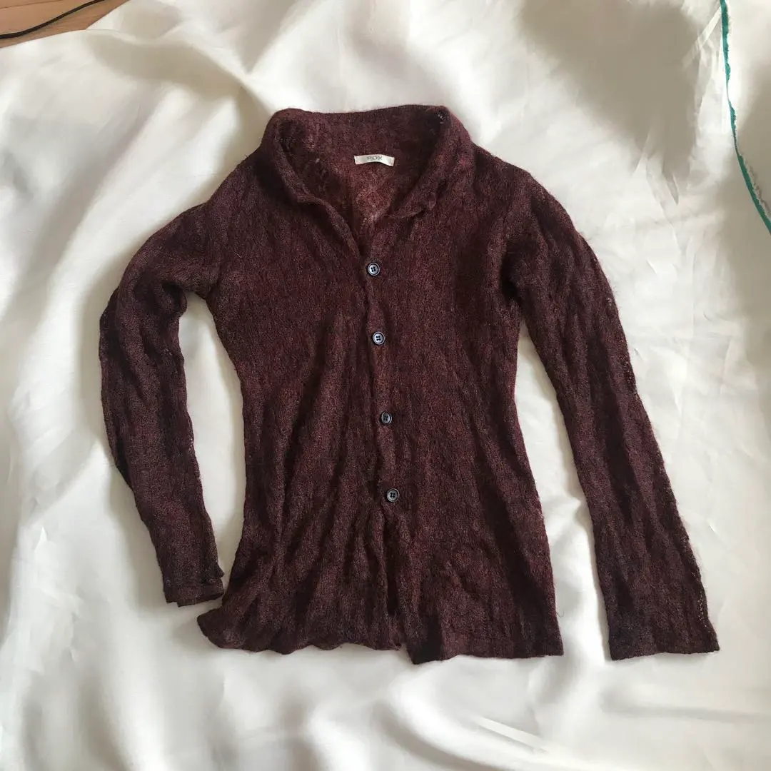 Thumbnail of A cute, see-through vintage cardigan.