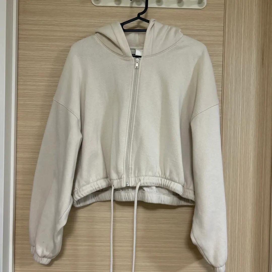 Thumbnail of H&M Cream-colored hooded sweatshirt, size M