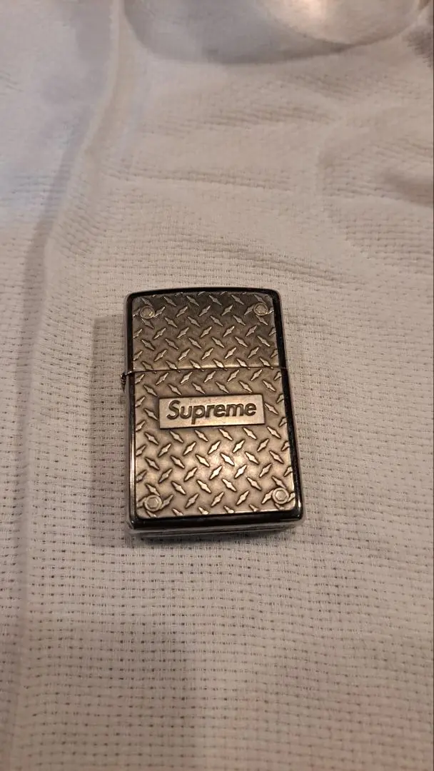 Supreme - Diamond Plate Zippo - UG.SHAFT