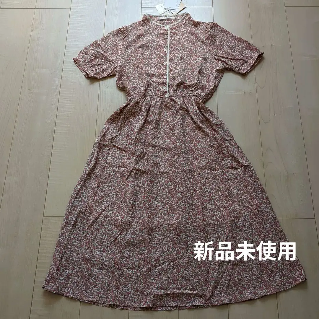 Thumbnail of New with tags, floral short-sleeved shirt dress, size M, elastic waist