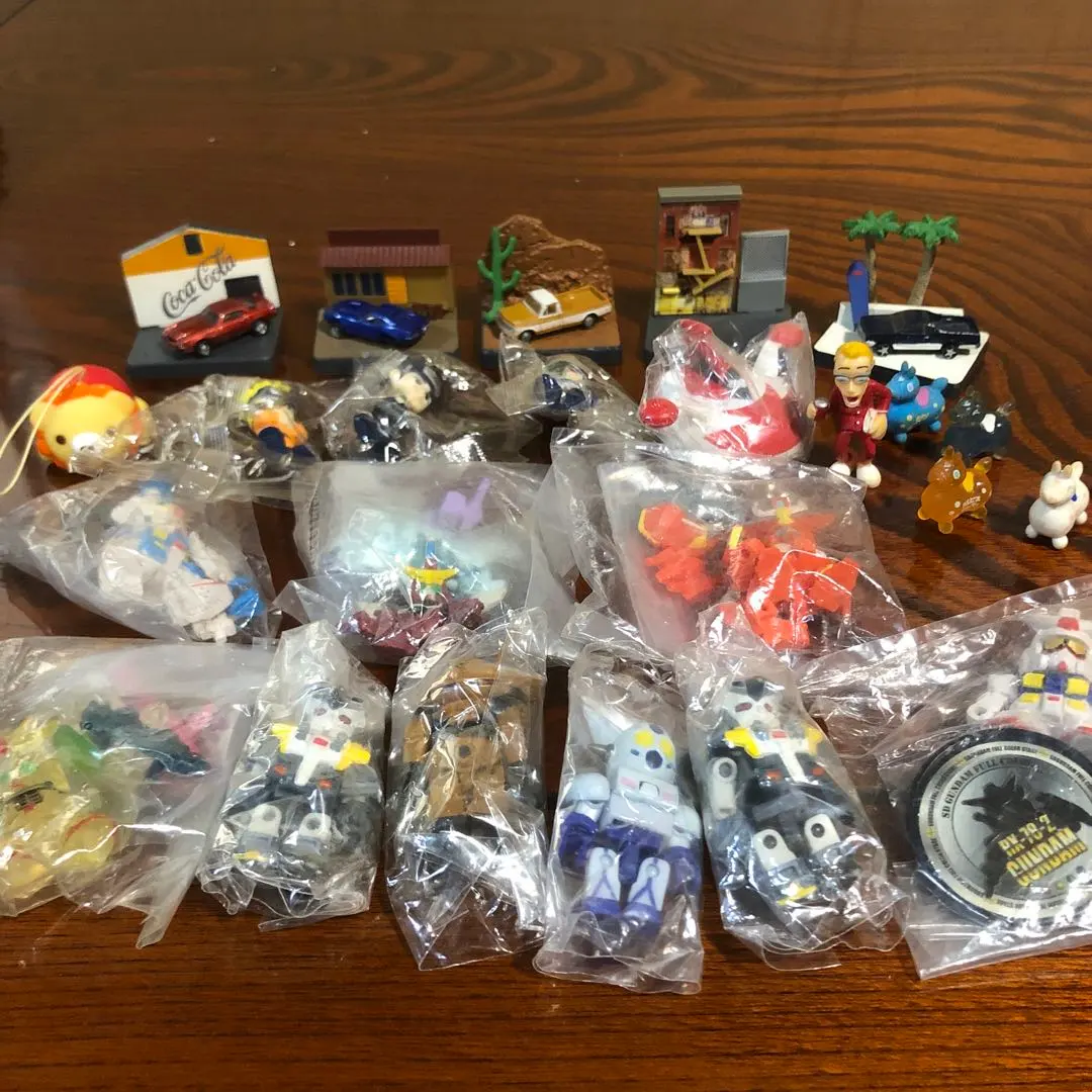 Thumbnail of Capsule toy set, many: Gundam, Naruto, JoJo's Bizarre Adventure figures, some unused.