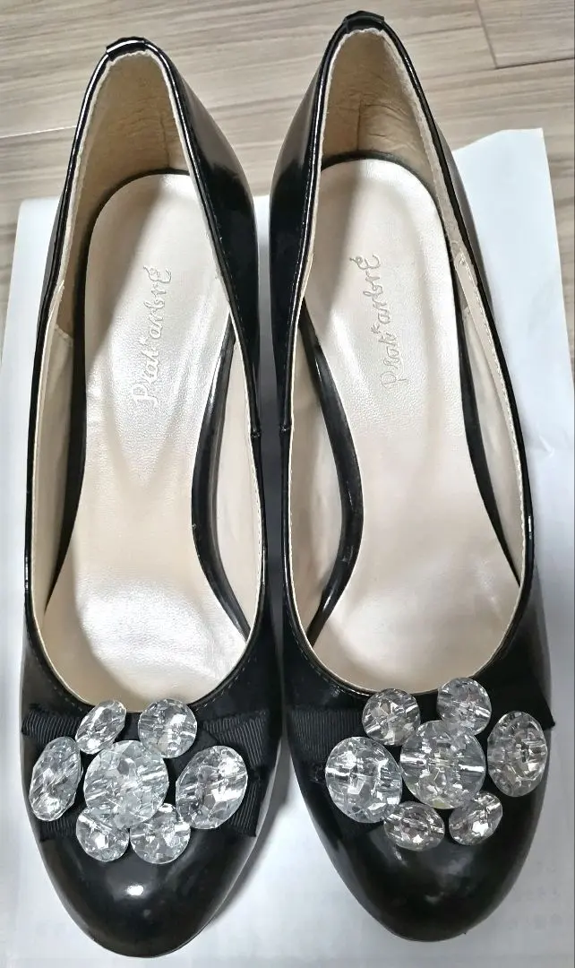 Thumbnail of Black pumps with crystal embellishments