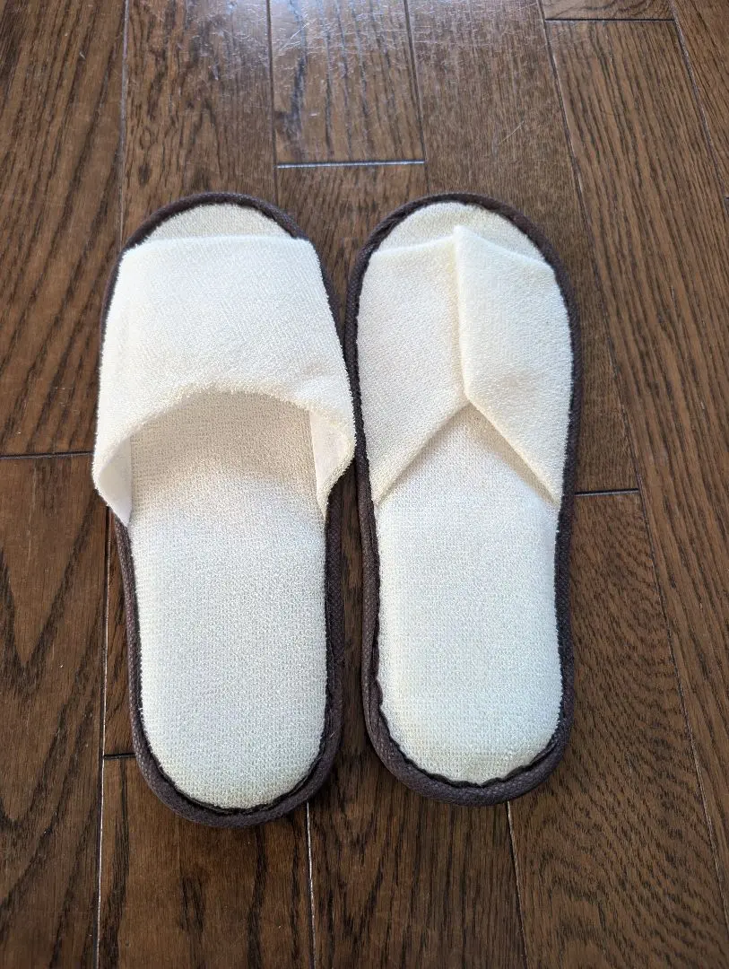 Thumbnail of Soft, cream-colored slippers