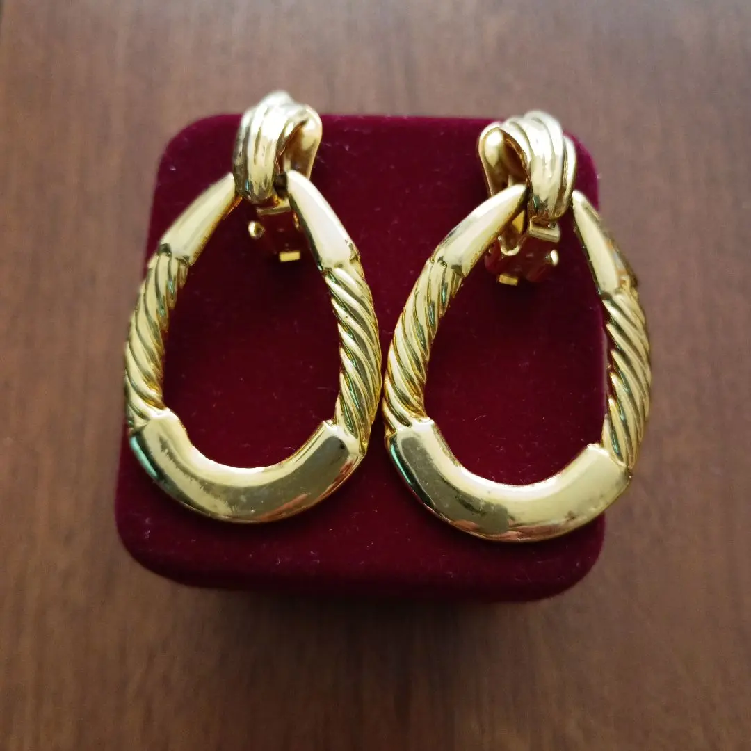Thumbnail of Gold twist design earrings