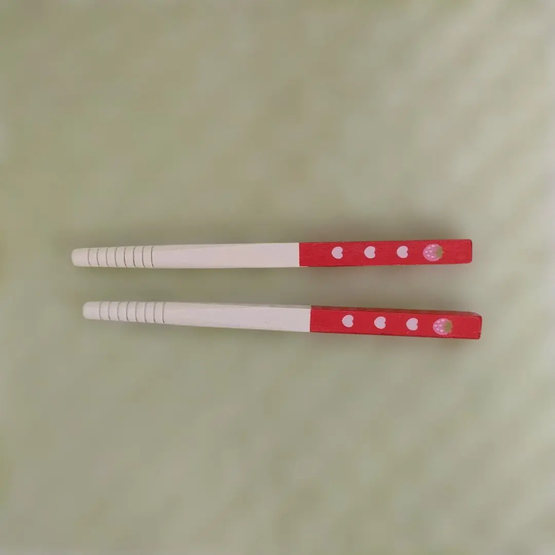 Thumbnail of Red and white wooden chopsticks