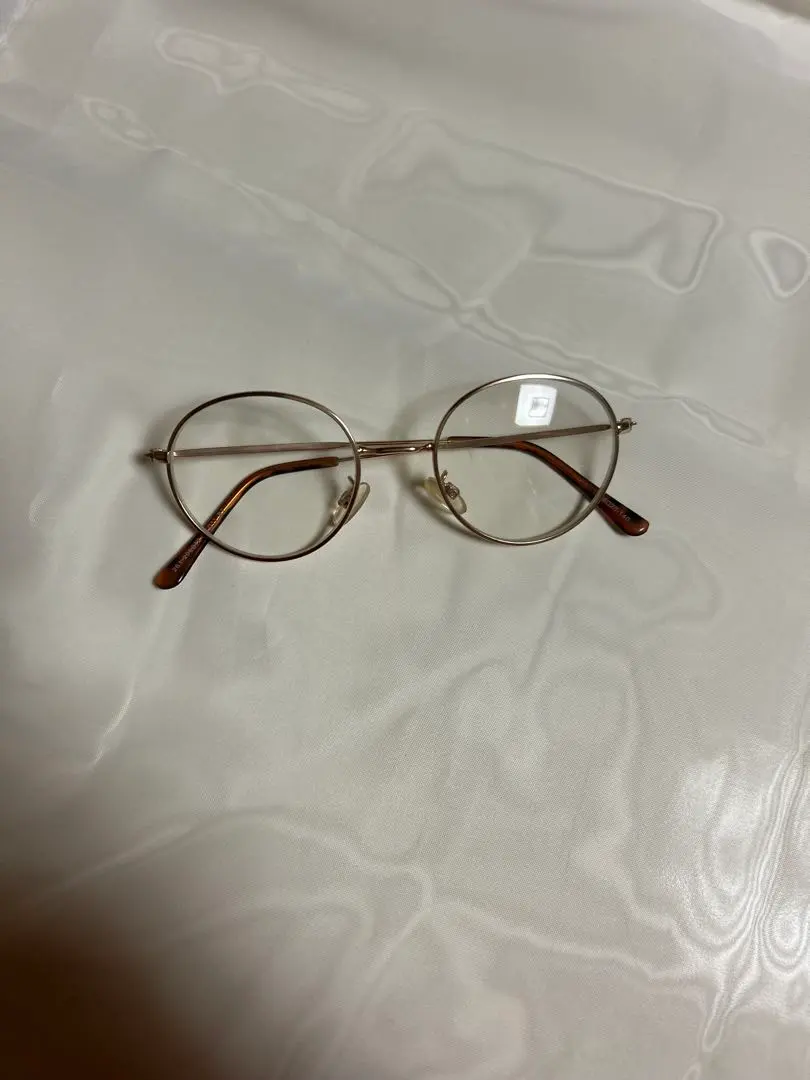 Thumbnail of Gold round frame glasses