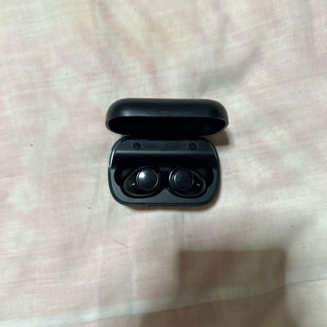 Thumbnail of Black wireless earbuds
