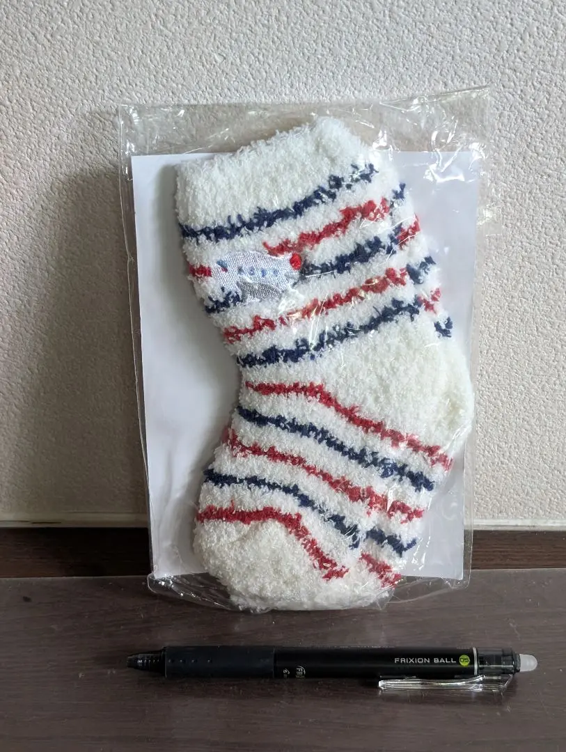 Thumbnail of Like new JAL amenity children's socks, fluffy socks, unused, in-flight toy