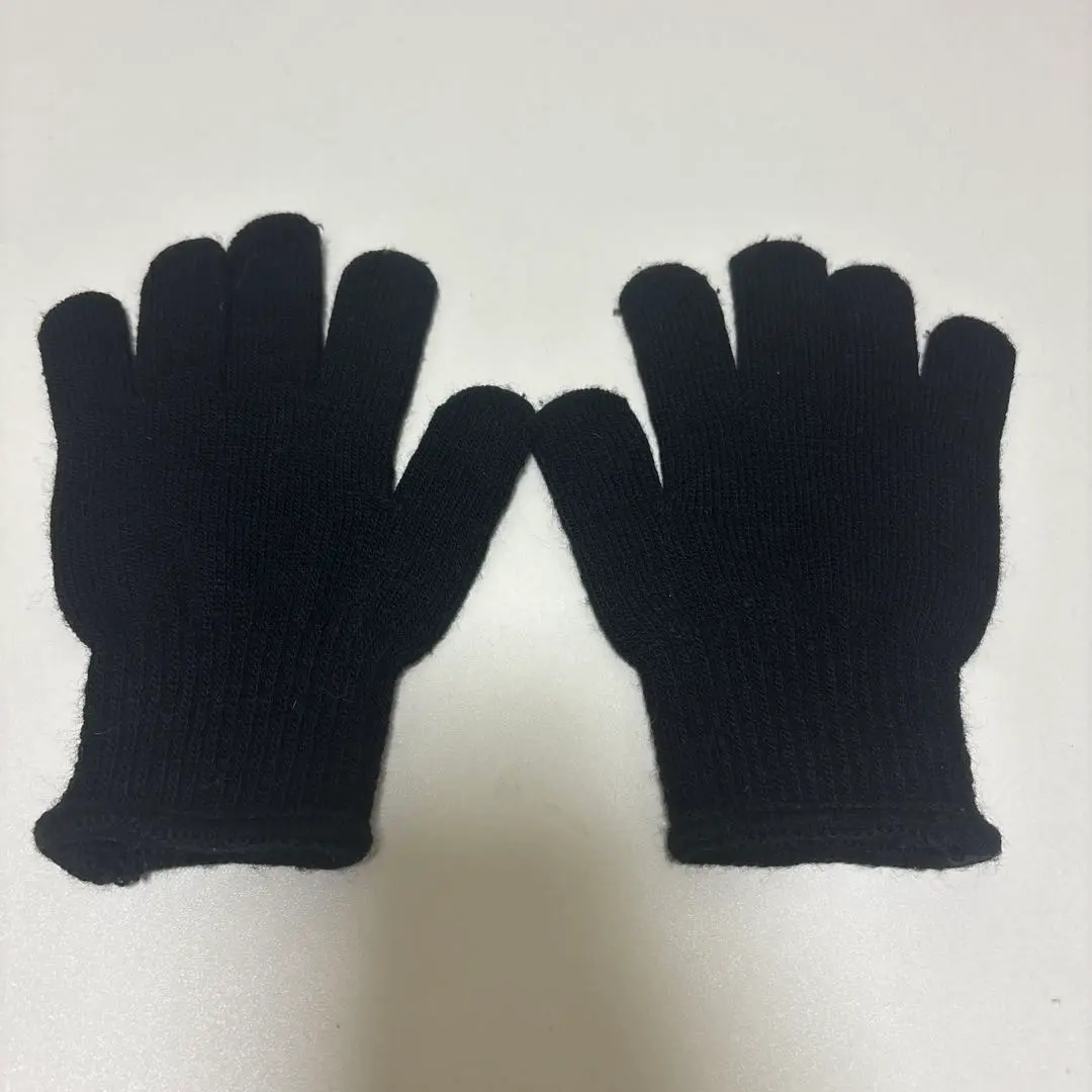 Thumbnail of Black five-finger knit gloves for women and children