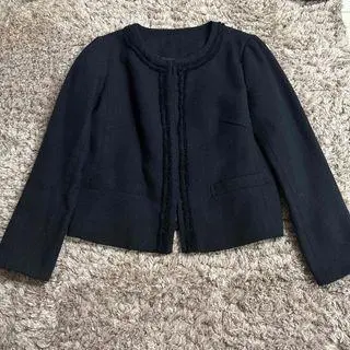 Thumbnail of Black collarless jacket, tweed style