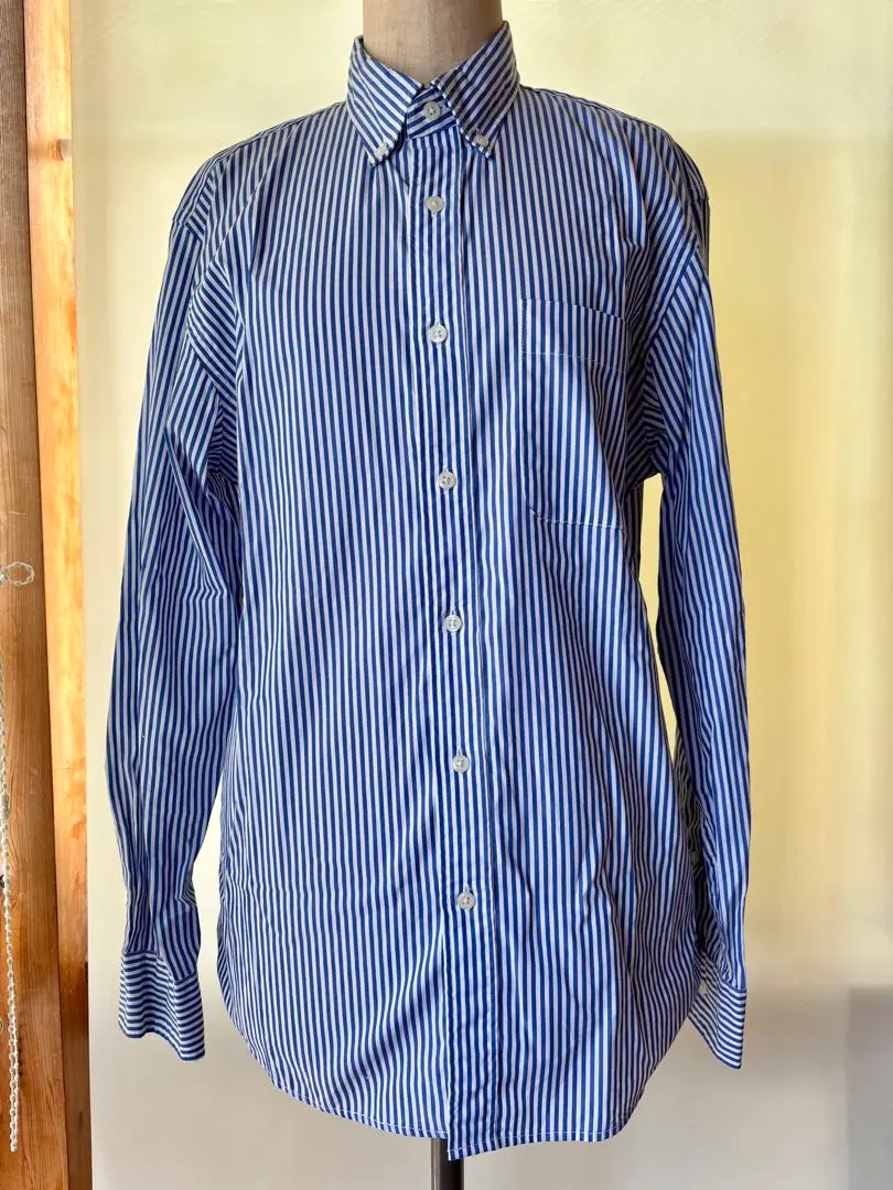 Thumbnail of Uniqlo blue and white striped long-sleeved shirt