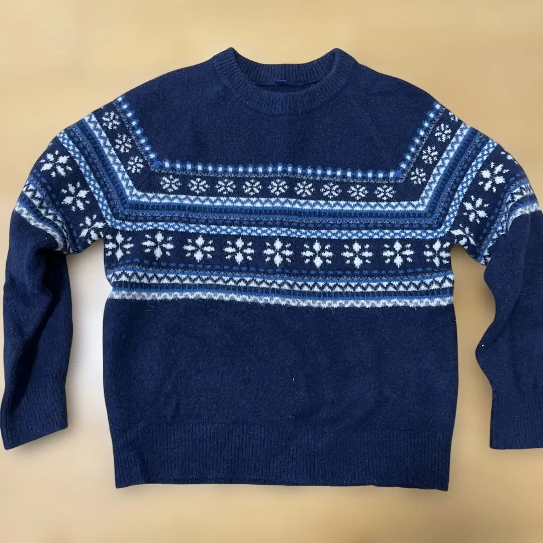 Thumbnail of Navy snowflake pattern sweater, size 140
