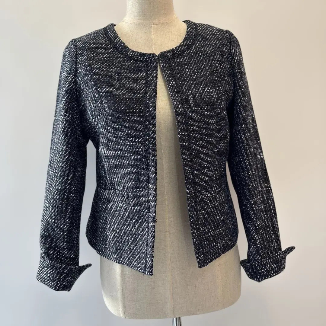 Thumbnail of Excellent condition Purelast outerwear, collarless jacket, size M, navy