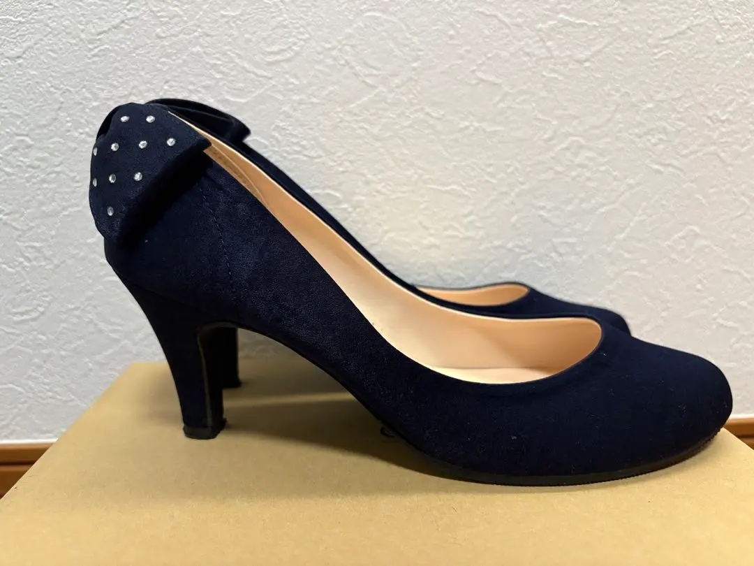 Thumbnail of Navy suede-style pumps with ribbon