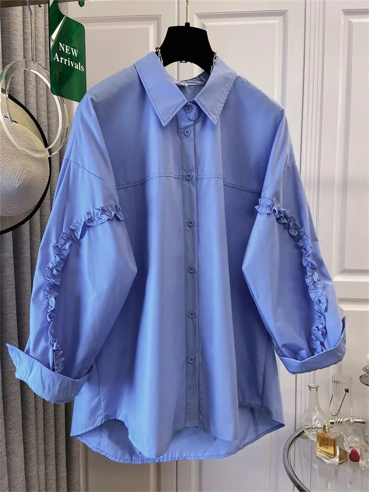 Thumbnail of Stylish, sophisticated, and fashionable shirt blouse. Casual, with a high degree of style. Solid color.
