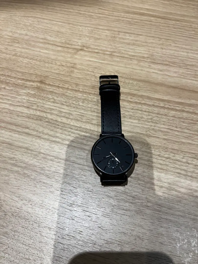 Thumbnail of Black leather analog watch