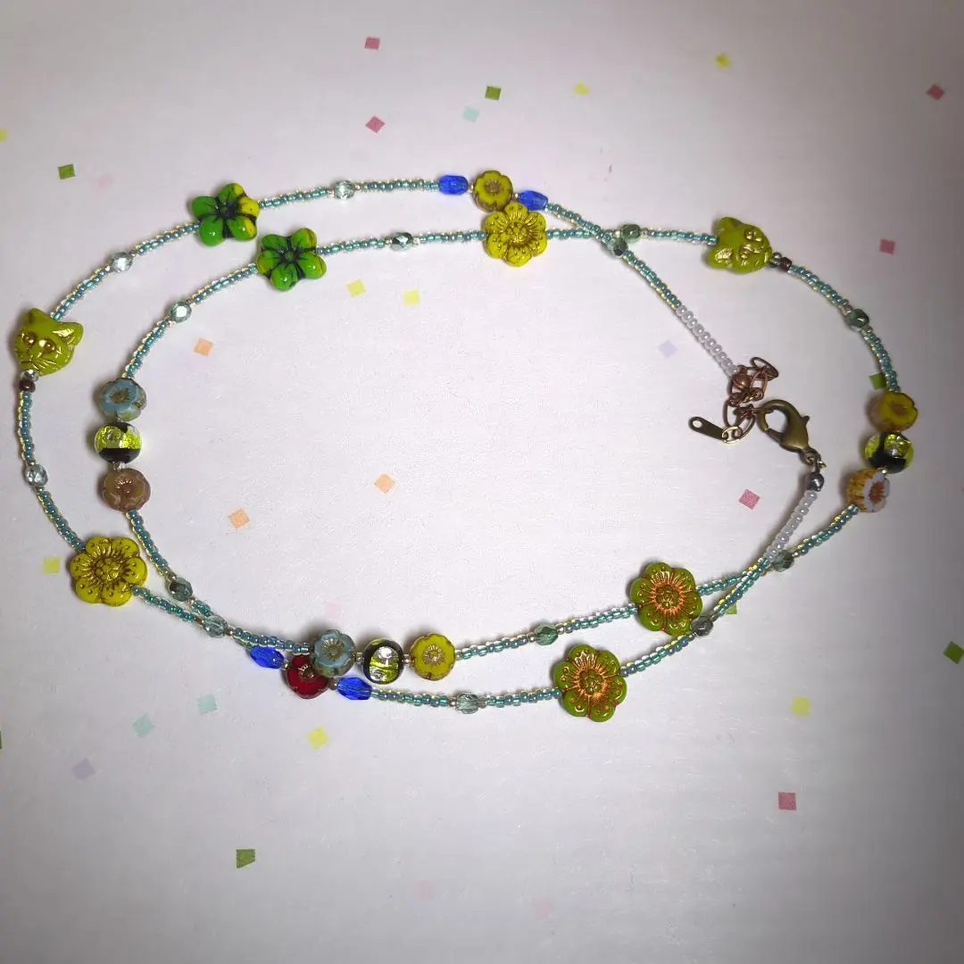 Thumbnail of Gold leaf infused glass and light green cat necklace