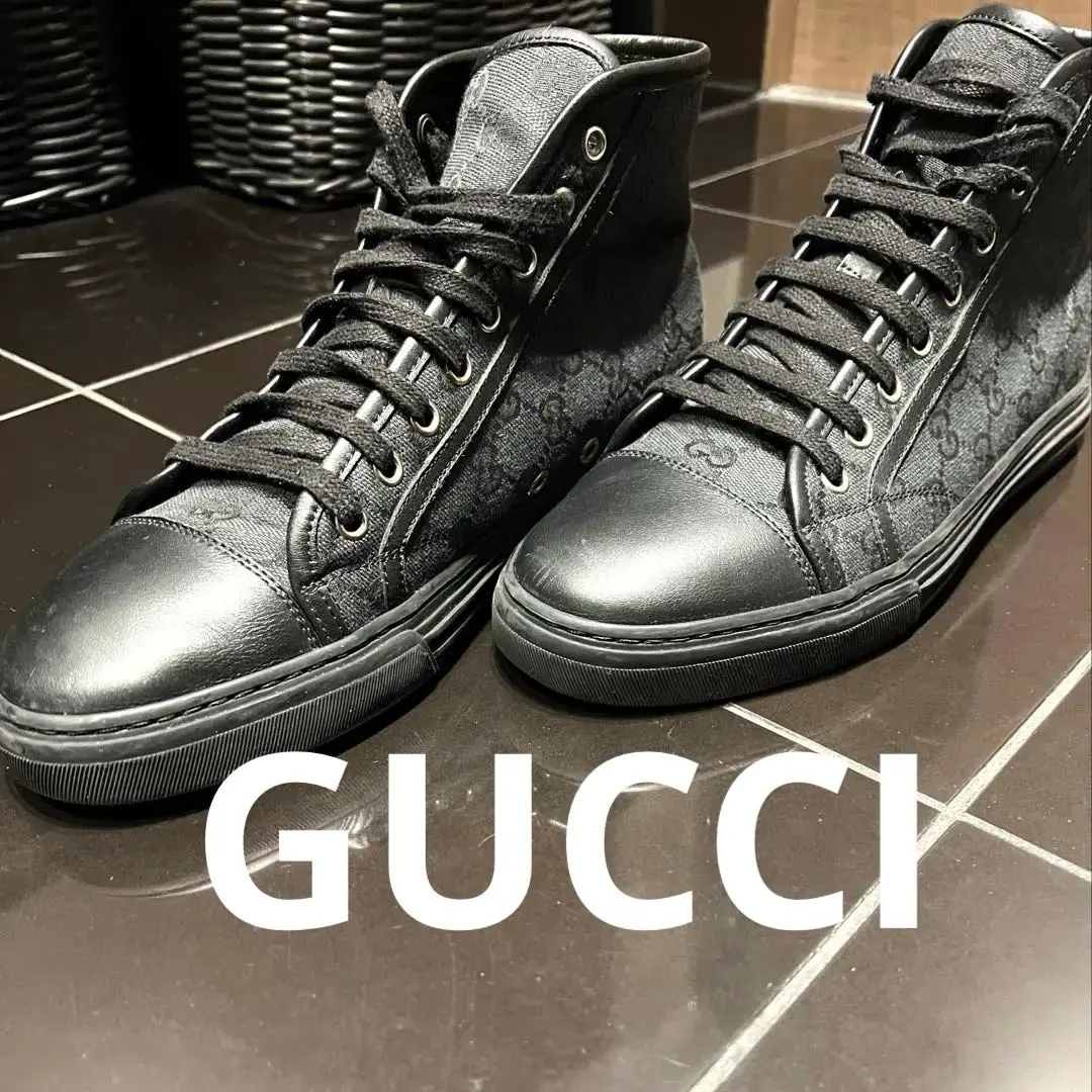 Thumbnail of Black high-top sneakers