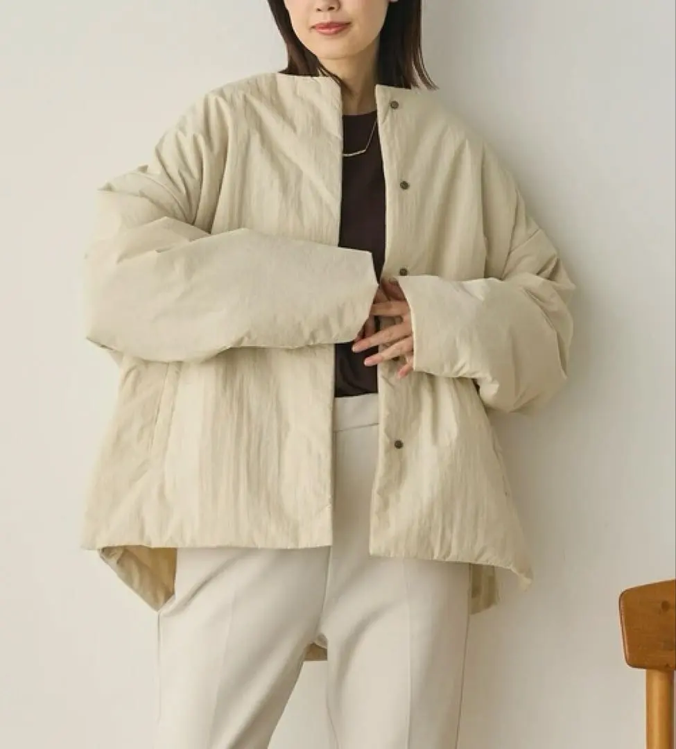 防潑水無縫線側邊拉鍊大衣 / 米白色 的縮圖