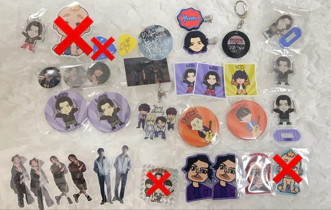 Thumbnail of Young Skinny merchandise: Can badges, stickers, keychains, acrylic stands. Individual sales OK.