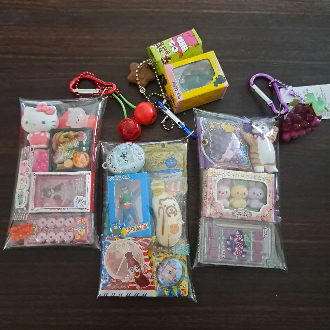 Thumbnail of Gacha-filled Pouch Set of 3: Red, Blue, Purple