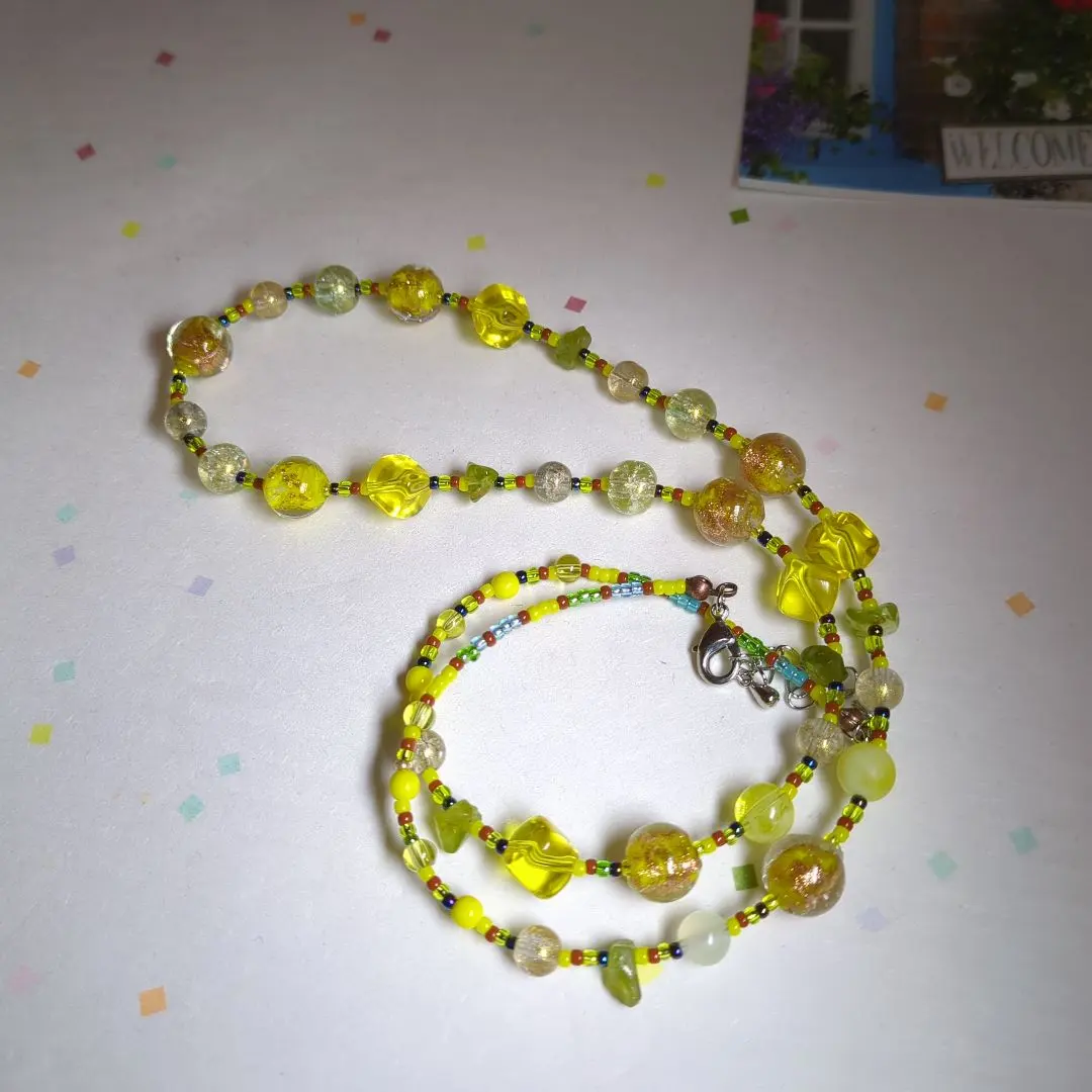 Thumbnail of Yellow glass necklace