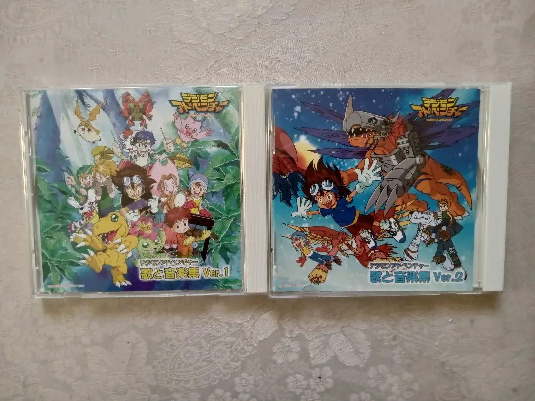 デジモンアドベンチャー」歌と音楽集Ver.1＆Ver.2　帯＆シール付き Amazon.co.jp: デジモンアドベンチャー 歌と音楽集 Ver.2