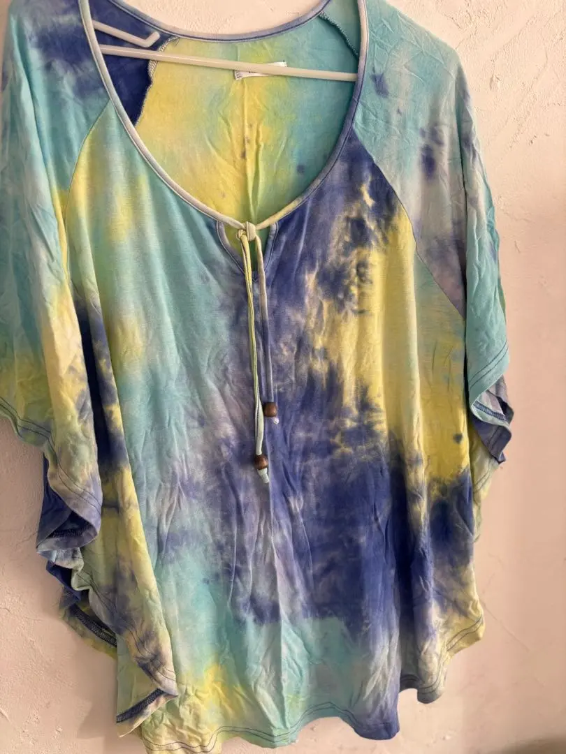 Thumbnail of T-shirt, orange dye