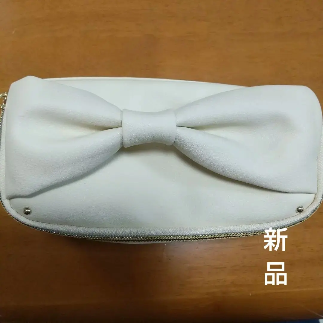 化妝包 全新 米色 蝴蝶結可愛 的縮圖