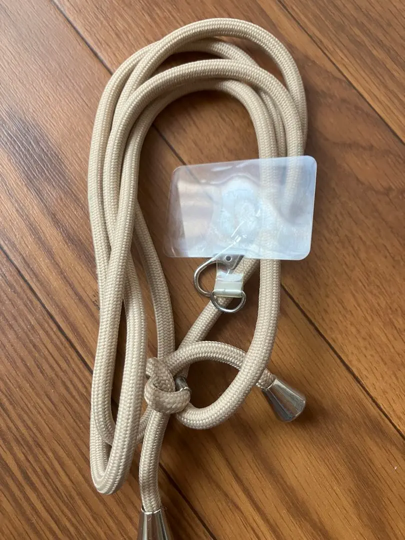 Thumbnail of Beige smartphone shoulder strap