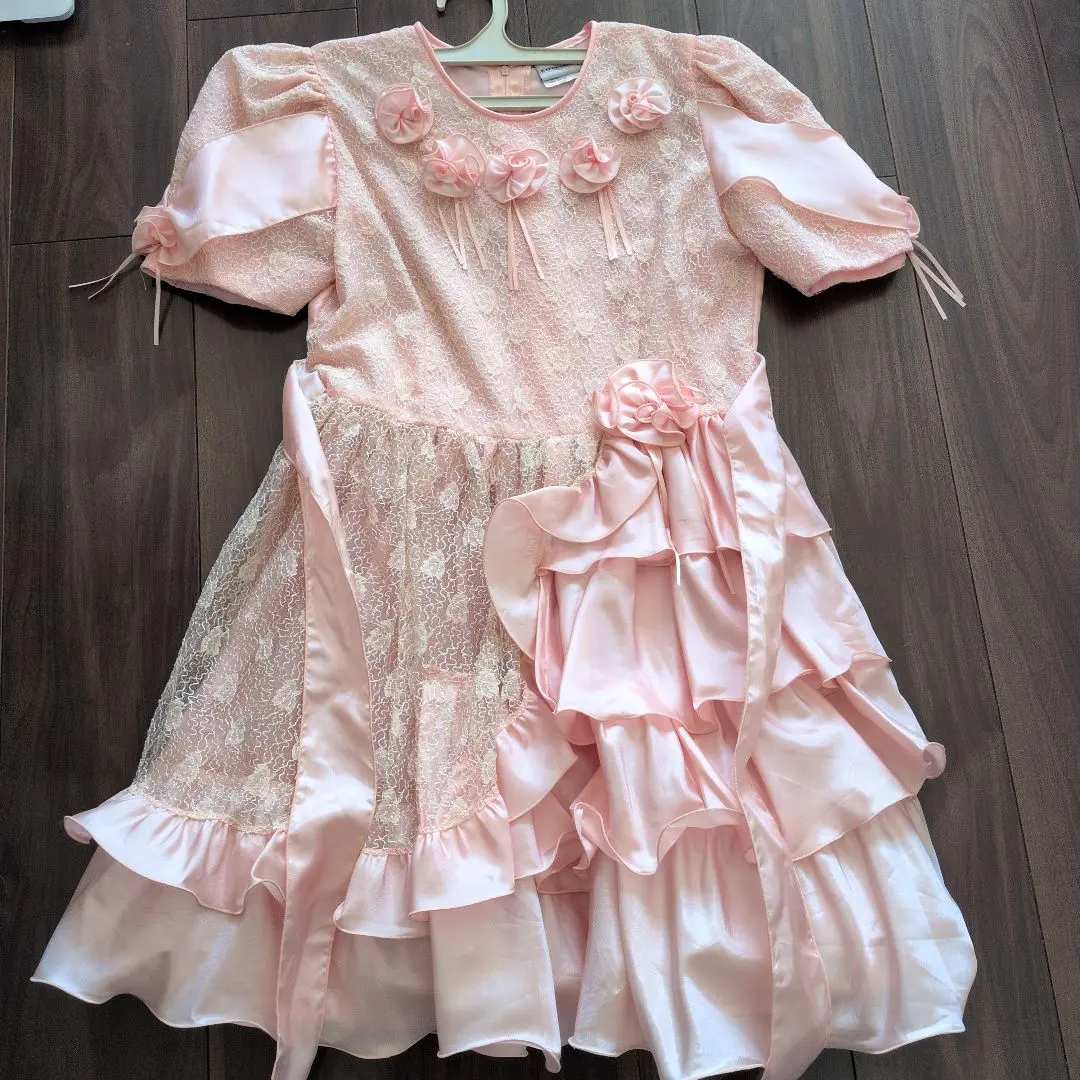 Thumbnail of Pink formal dress with floral decorations