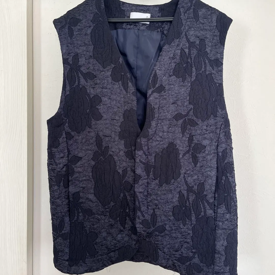 Thumbnail of Dark gray floral lace collarless vest