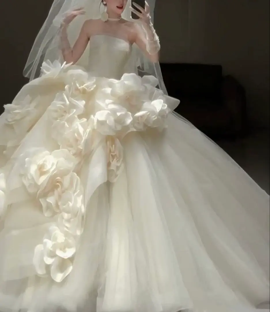 Thumbnail of Wedding dress with flower decorations