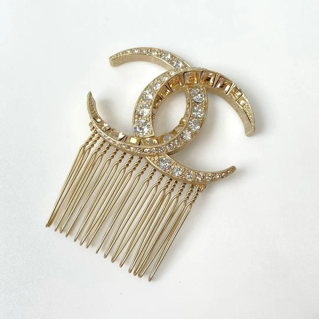CHANEL 上品な金属製 カメリアのコーム カメリア モチーフ – その他のアクセサリー | CHANEL