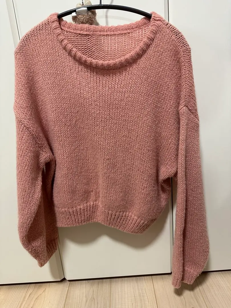 Thumbnail of Pink knit sweater, long sleeves, crew neck