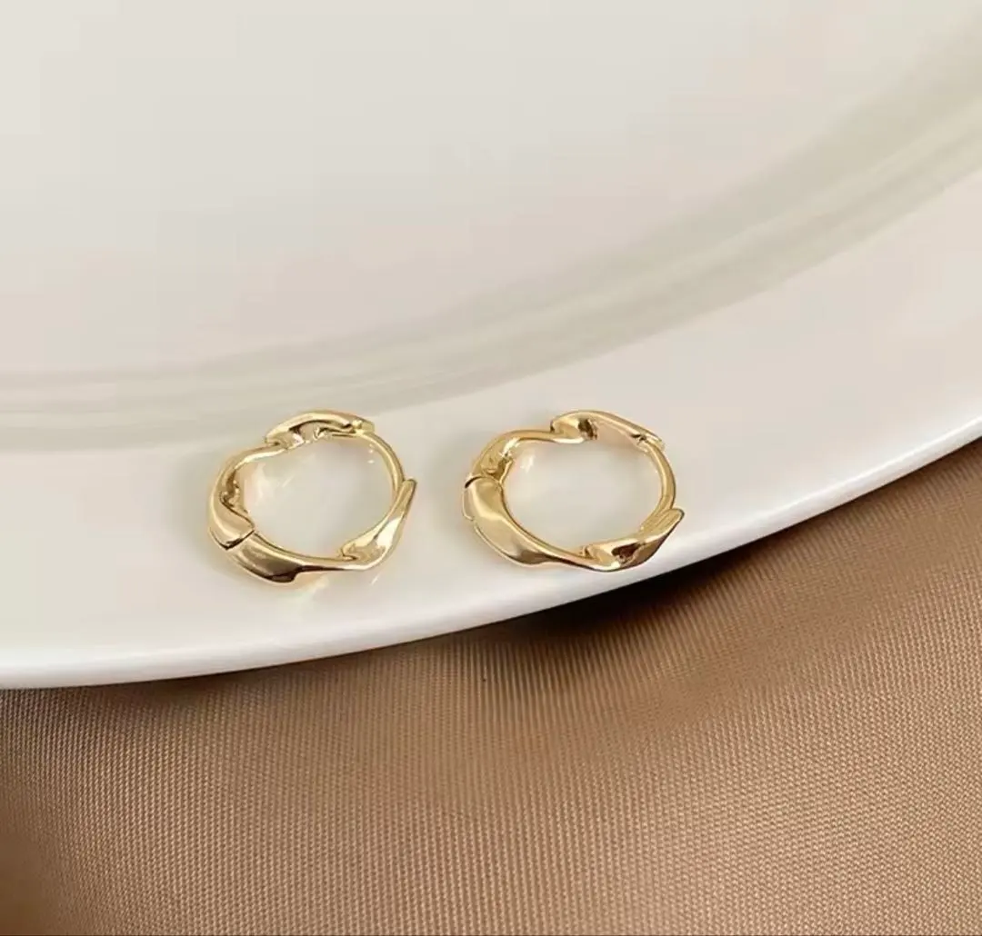 Thumbnail of Twisted Gold Hoop Earrings