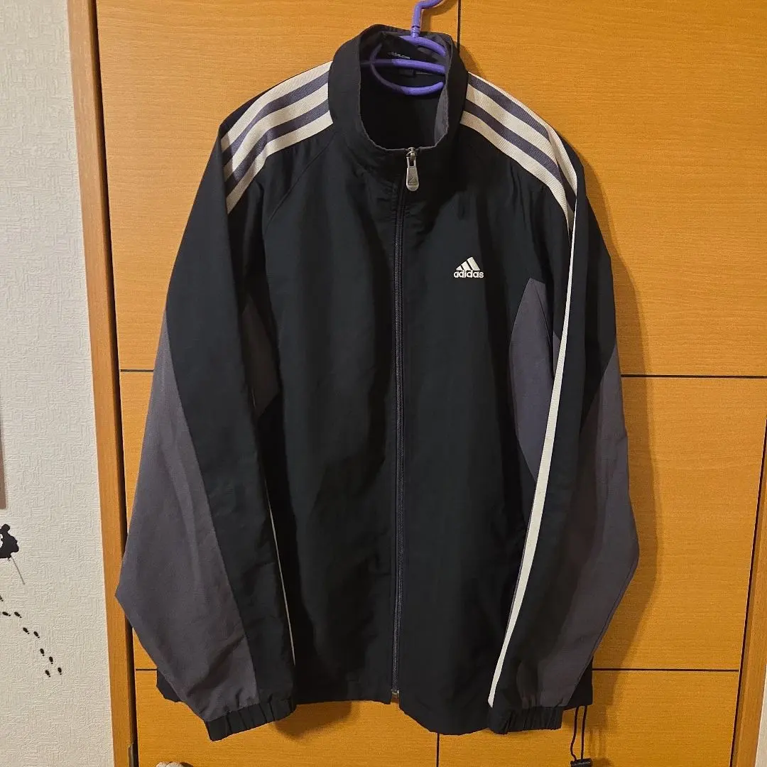 Thumbnail of Adidas zip-up jacket, size L, black/gray