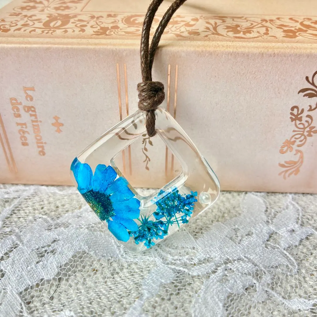 Thumbnail of Resin necklace with pressed flowers