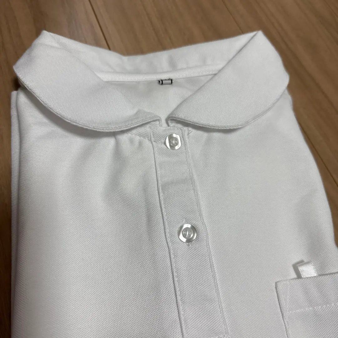 Thumbnail of White polo shirt, size 160