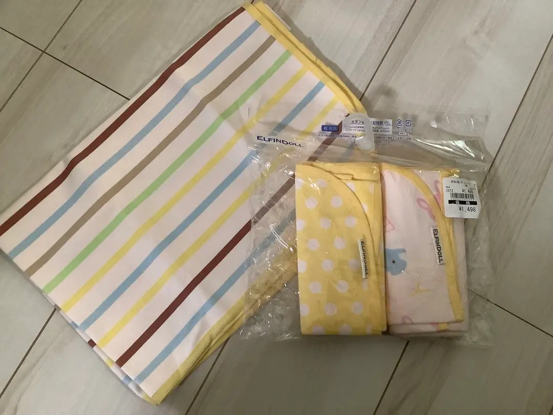 Thumbnail of 2 unused, 1 used, total 3 diaper changing sheets