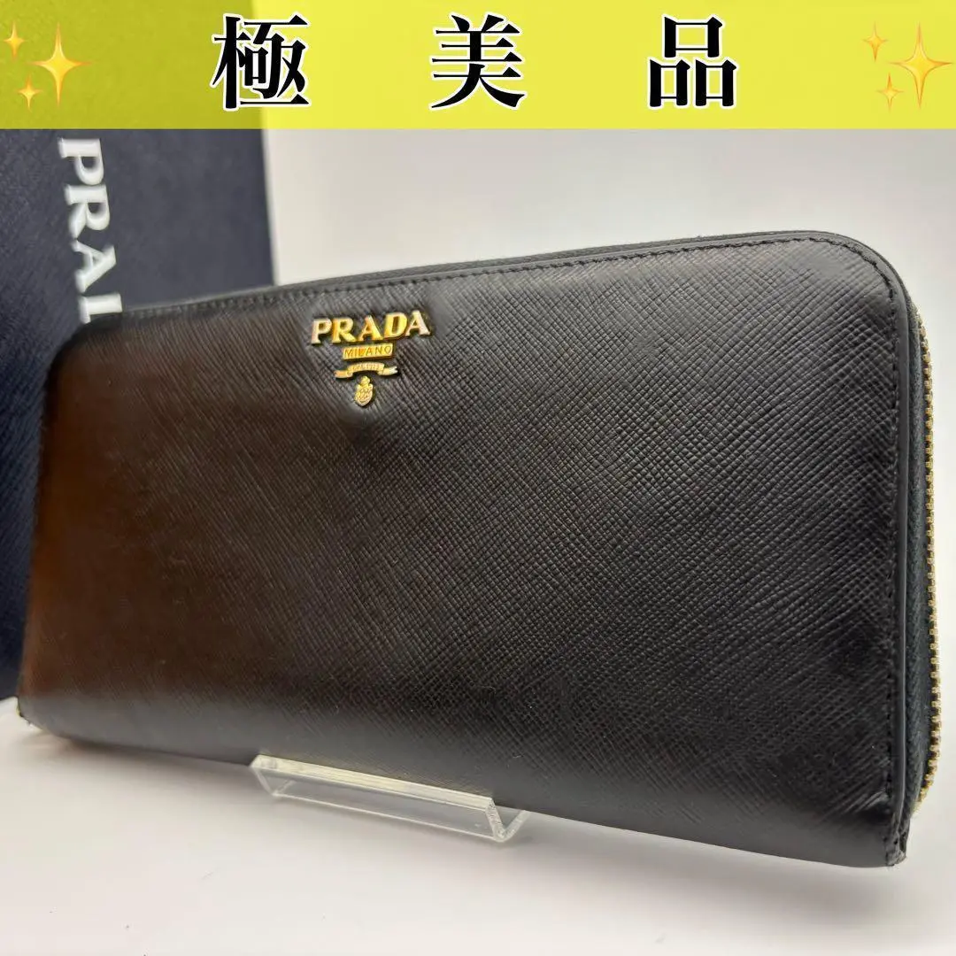 Thumbnail of ✨Excellent Condition✨ Prada Long Wallet Round Zip Gold Logo Saffiano Black