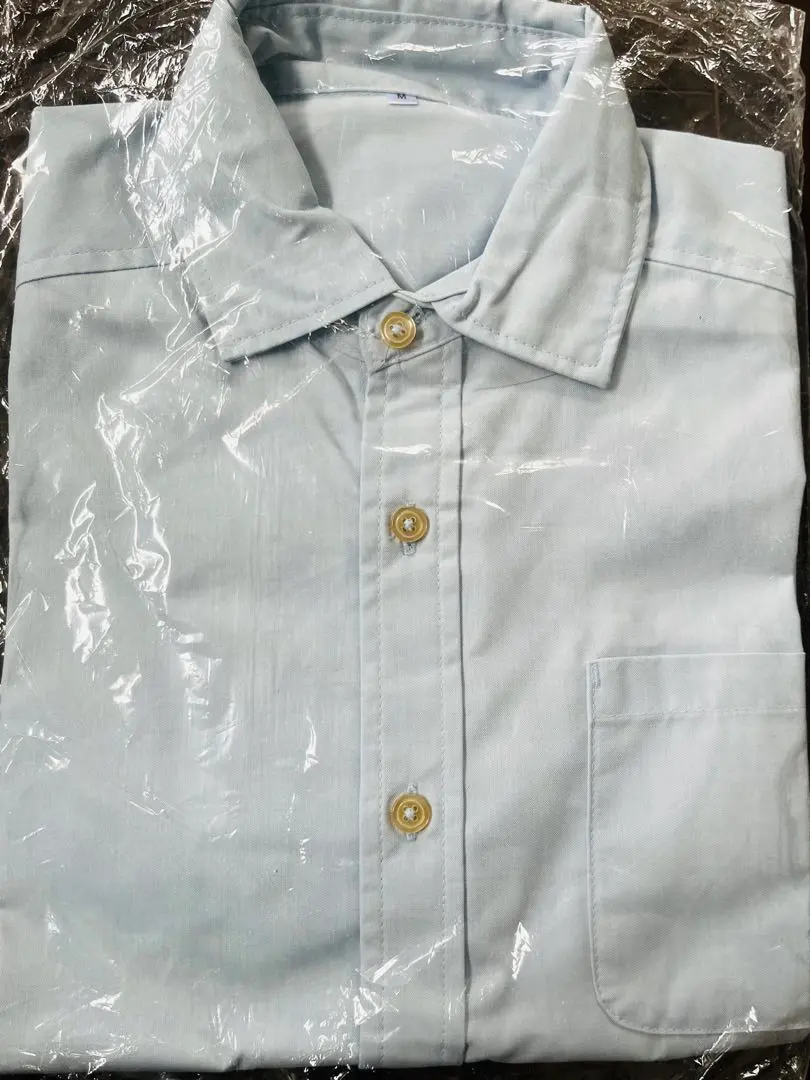 Thumbnail of New, unused denim-style cotton pale blue short-sleeved shirt