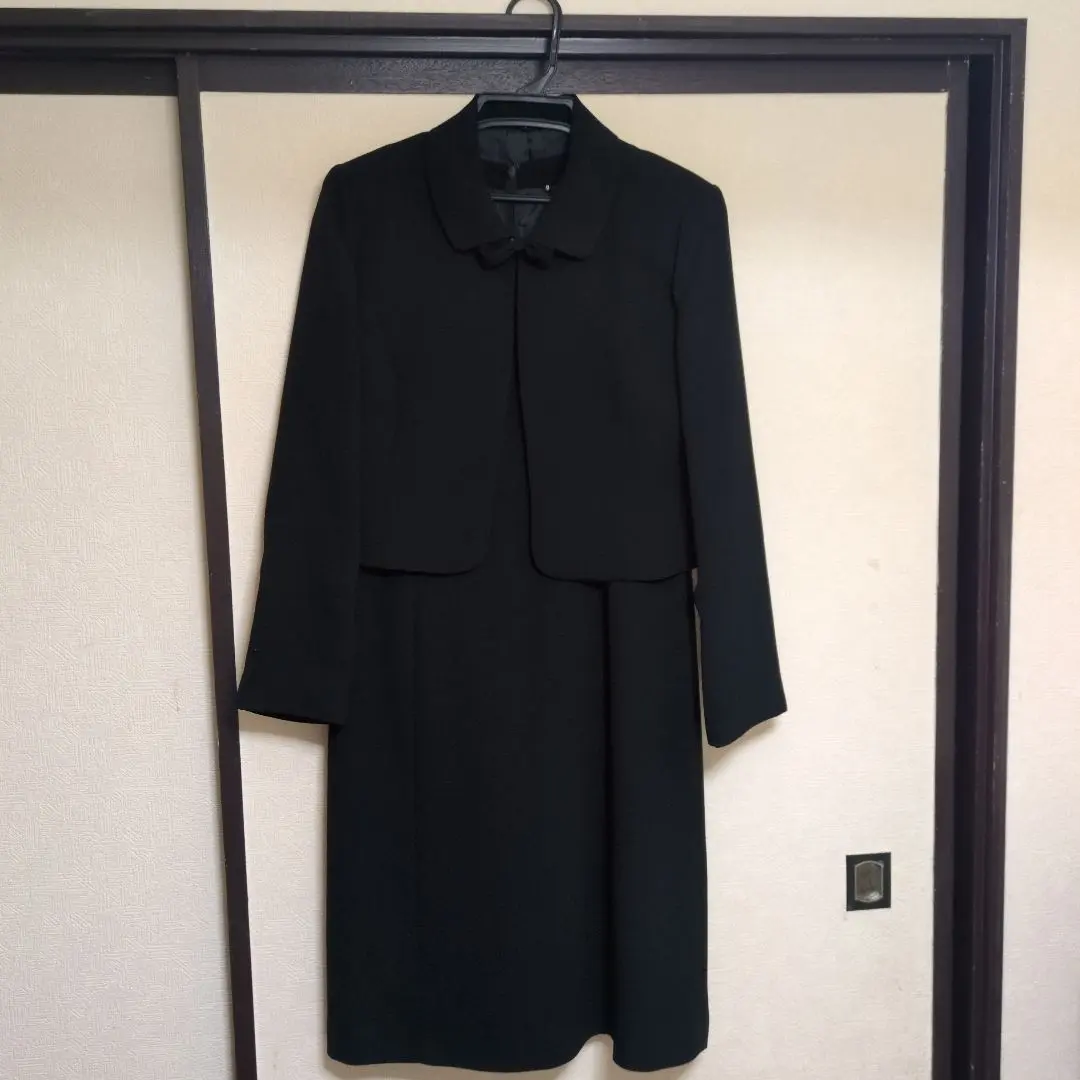 Thumbnail of Black one-piece suit with jacket