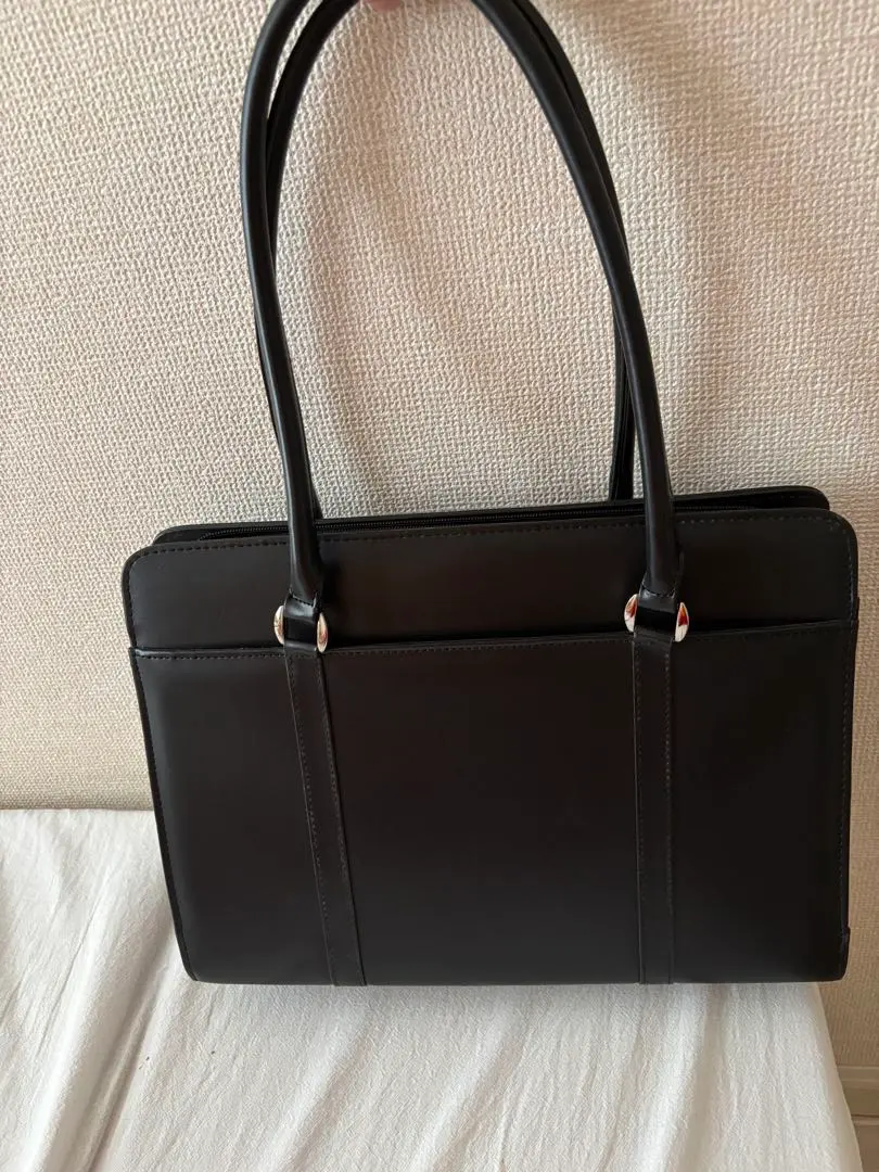 Thumbnail of Black synthetic leather business bag
