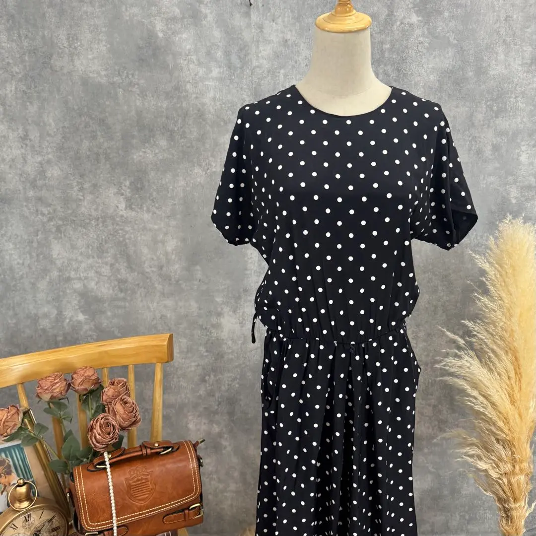 Thumbnail of USA-made vintage dress with white dot pattern, retro girly style, fits like a size M
