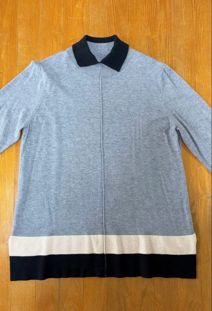 Thumbnail of Gray long-sleeved knit sweater with collar