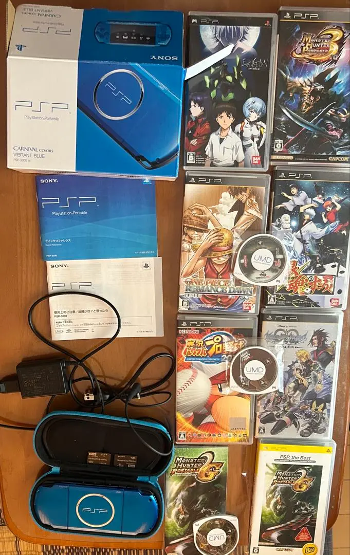 Thumbnail of Junk item: SONY PSP-3000 Carnival Blue console, many games included, with box