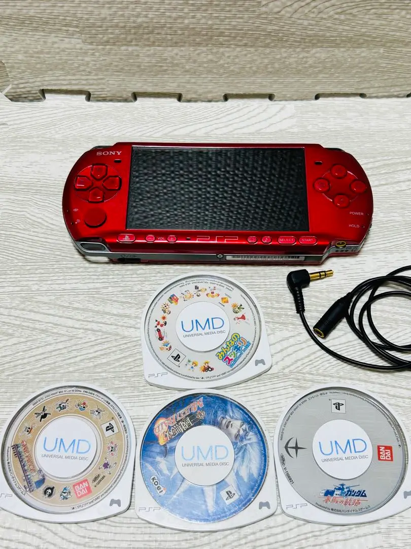 ぶ*ん 様 SONY PSP 主機 紅色 附帶 4 片遊戲軟體【幾乎是故障品】 的縮圖