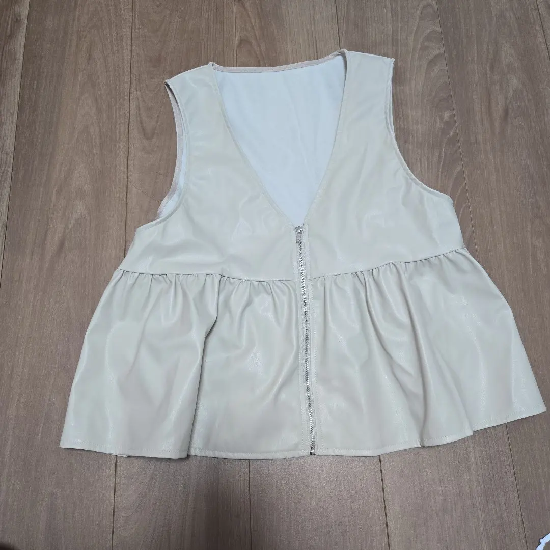 Thumbnail of Faux leather zip-up vest with contrasting panels